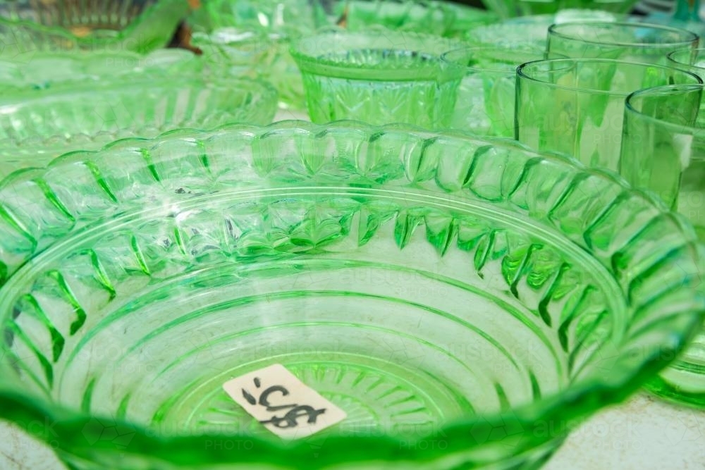 A collection of green glass crockery - Australian Stock Image