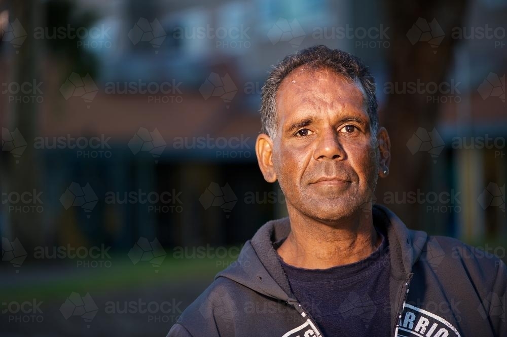Aboriginal Australian Man Looking at Camera - Australian Stock Image