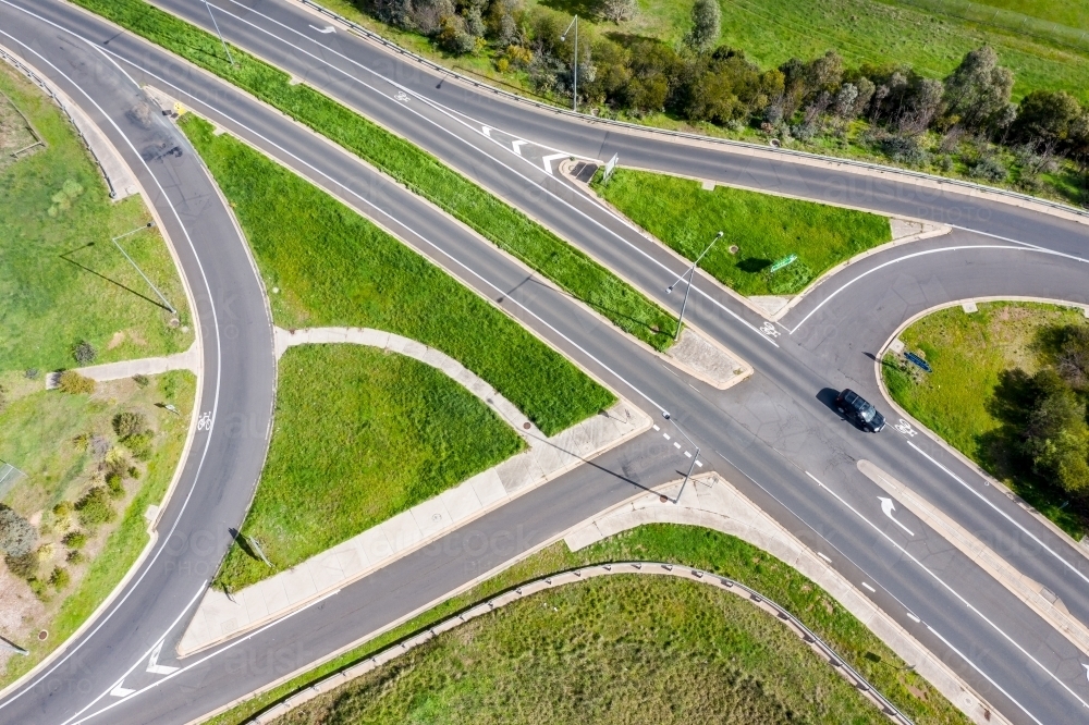 Aerial view of a freeway on and off ramp intersection - Australian Stock Image