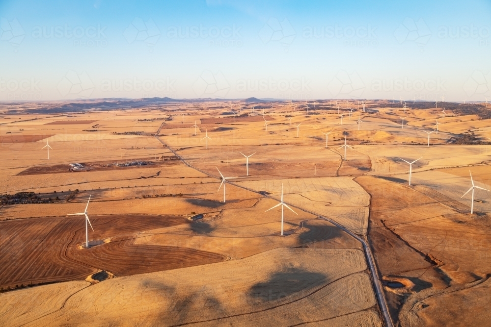 aerial view of wind turbines in farmland - Australian Stock Image