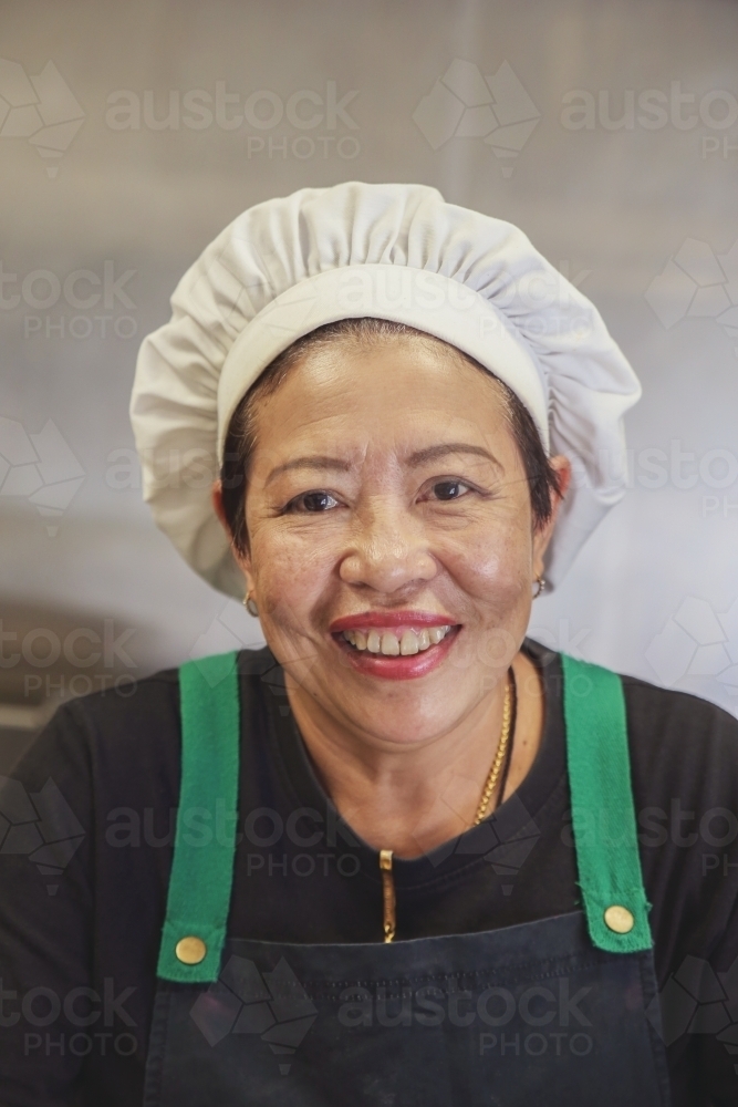 Asian woman chef portrait - Australian Stock Image