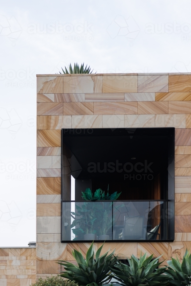 Balcony of modern sandstone residence - Australian Stock Image