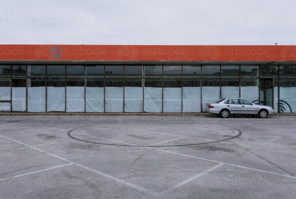 Deserted Car Park with Closed Down Shop - Australian Stock Image