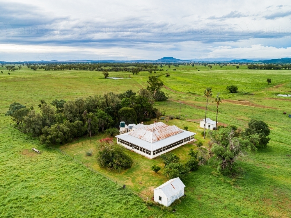 Farm homestead among green paddocks - Australian Stock Image