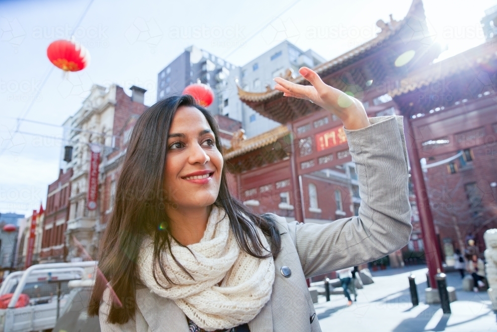 Happy Woman Exploring Chinatown - Australian Stock Image