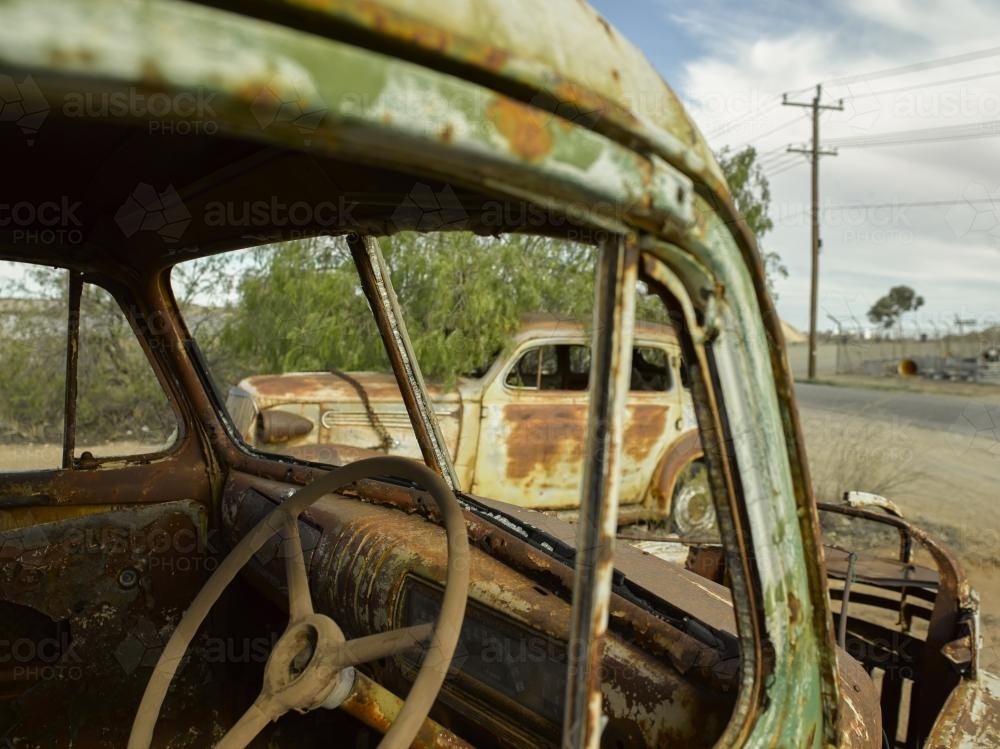 Interior of rusted out car - Australian Stock Image