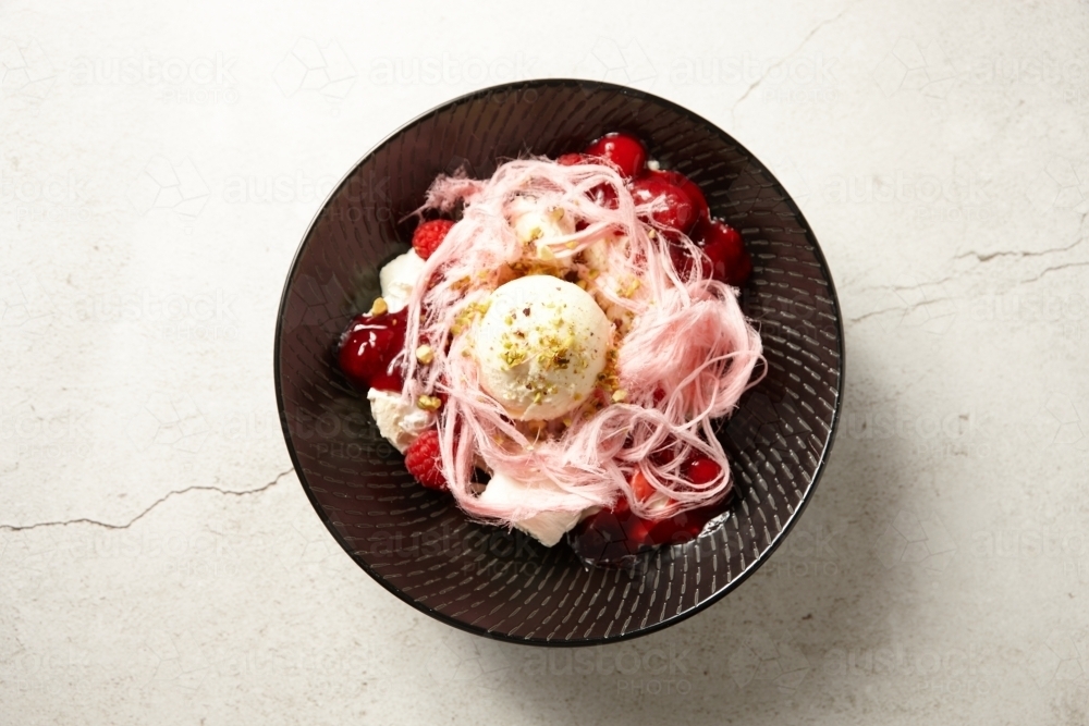 Overhead shot of ice cream and fairy floss dessert - Australian Stock Image