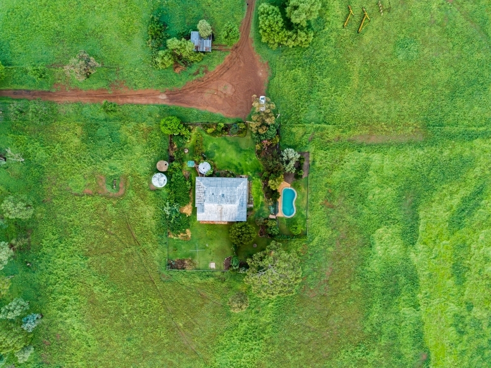 Overhead view of country house on rural farm - Australian Stock Image