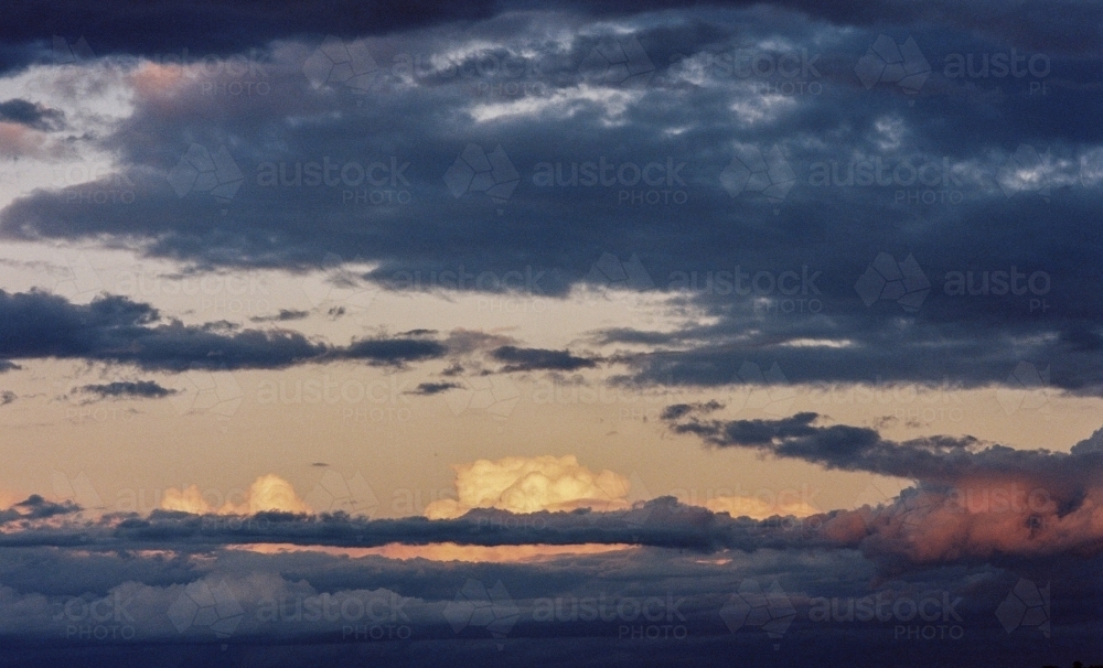 Peaceful Cloudy Sunset with blue and orange colours - Australian Stock Image