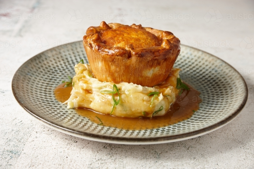 Plate with gourmet pie, mash potato and gravy - Australian Stock Image