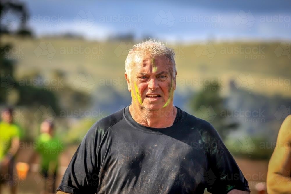 Retiree completing fitness course - Australian Stock Image