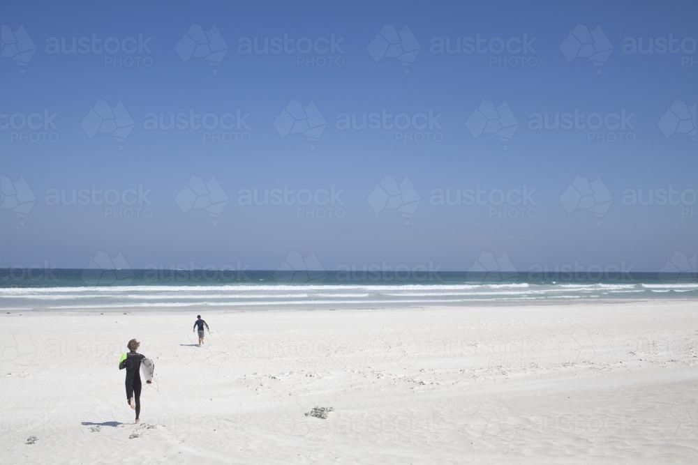 Running to catch the surf - Australian Stock Image