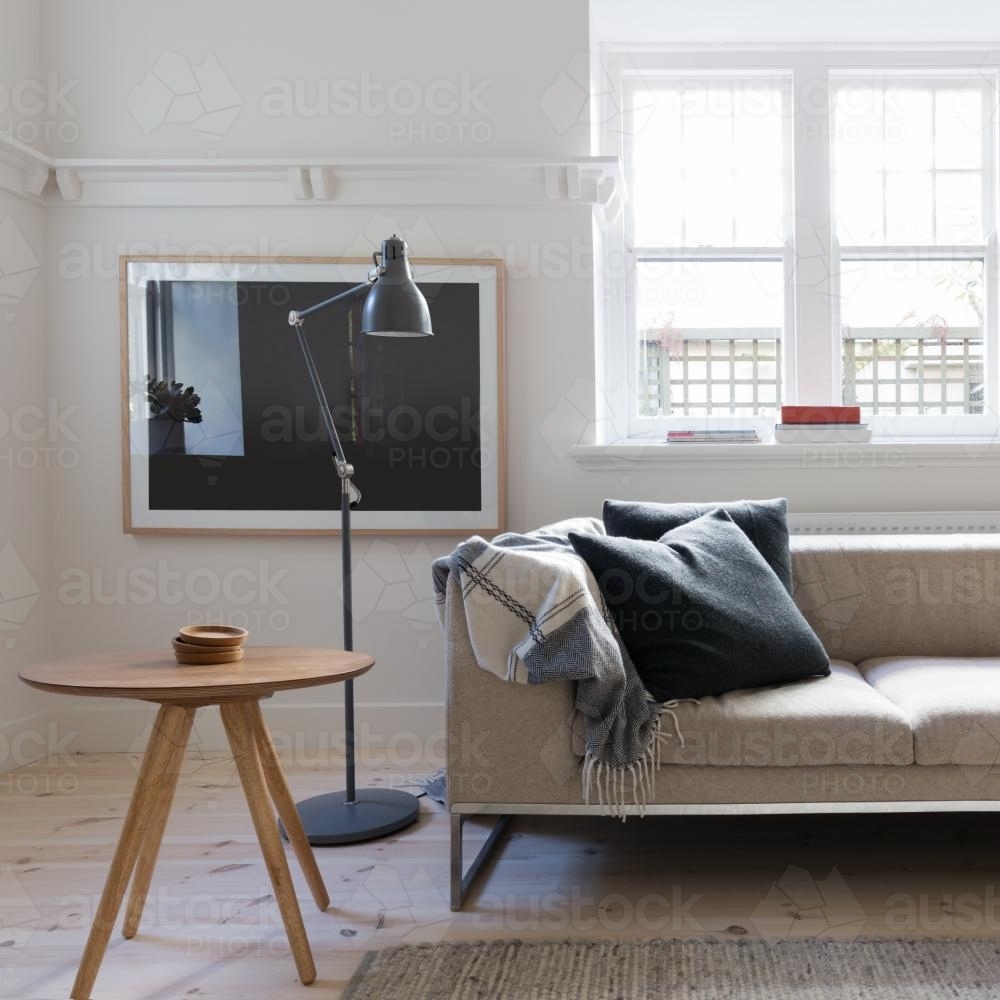 Scandi styled living room interior in art deco apartment - Australian Stock Image