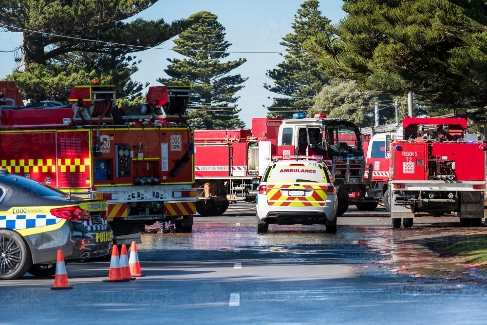 Scene with emergency service vehicles, ambulance, police, fire brigade - Australian Stock Image