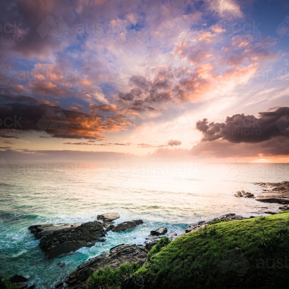 Sunrise over the ocean at Grassy Head on the NSW Mid North Coast - Australian Stock Image