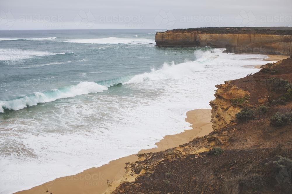 Waves crashing on a beach - Australian Stock Image