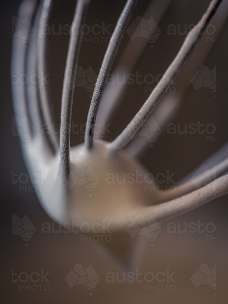 Whipped icing on a whisk - Australian Stock Image