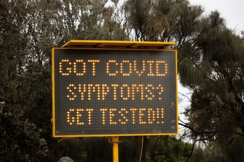 A sign during the COVID-19 corona virus pandemic which says 'Got Covid symptoms? Get tested'