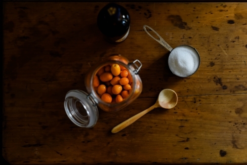 Aeria shot of Kumquats in bottling jar