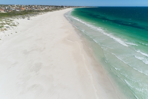Aerial shot of the sandy beach and water at Mullaloo Beach in Perth, Western Australia