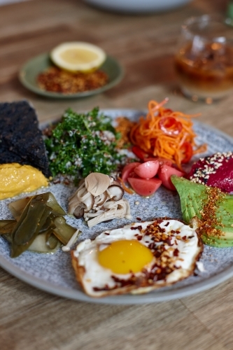 Close-up of healthy vegetarian meal on wooden table