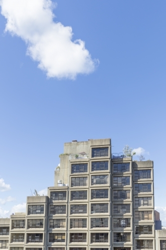 Clouds over concrete apartments