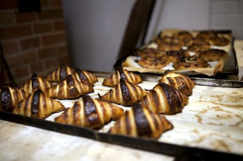 Freshly baked croissants on tray