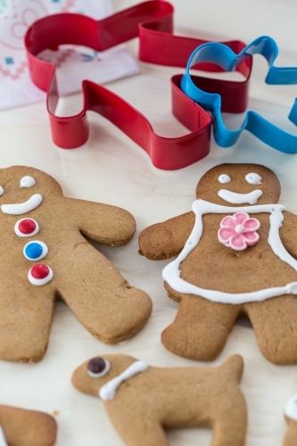 Ginger Bread man and woman with cookie cutters