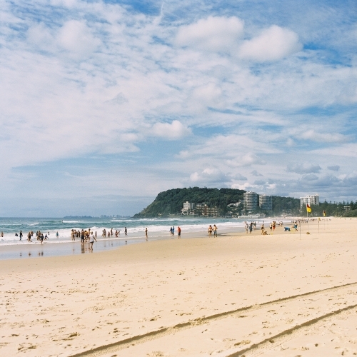 Gold Coast Beach with People and headland in the Distance