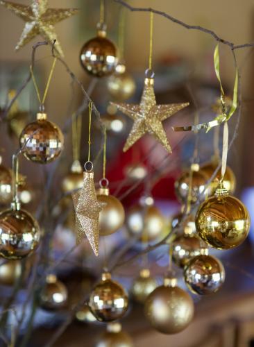 Golden Christmas baubles and stars
