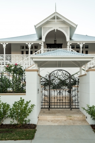 Grand Queenslander home with large front gate