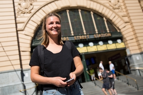 Happy Young Woman Waiting Outside Flinders Street Station