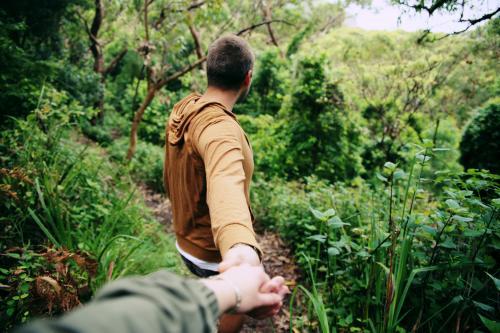 Holding Hands Walking in the Bush