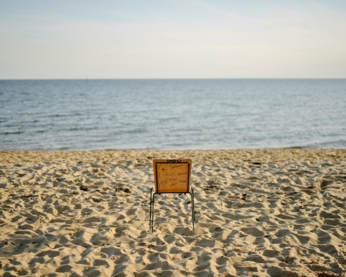 Lone chair left on the beach