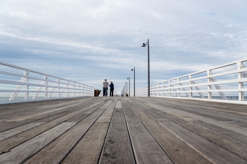 Low angle view of jetty boardwalk
