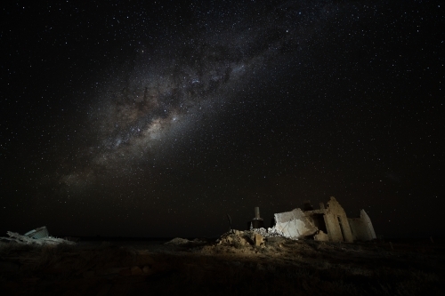 Milky Way over ruined stone building