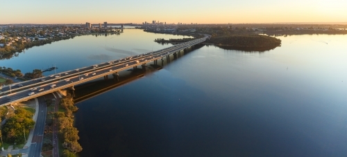 Mount Henry Bridge and Perth skyline at sunrise from the air