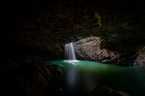 Natural Bridge with waterfall into cave