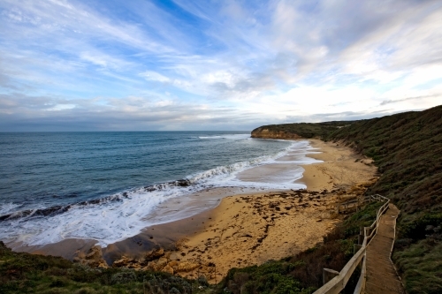 Panoramic view of a surf beach at dusk
