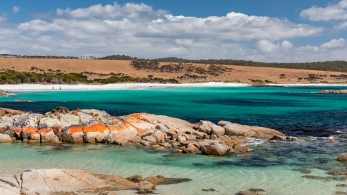 Pristine turquoise water, white sand & orange rocks at Bay of Fires, Tasmania