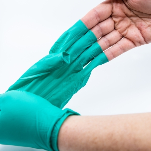Safely removing green gloves