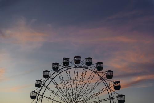 Silhouette of Ferris Wheel at Sunset