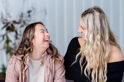 sisters, from a series featuring a woman with Down Syndrome