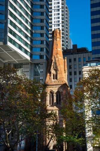 St George's Church sandstone spire surrounded by modern buildings