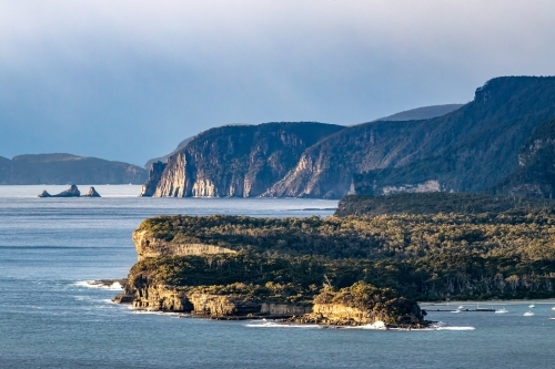View over Pirates Bay and Tasman Peninsula with sea cliffs, blue water and clear sky