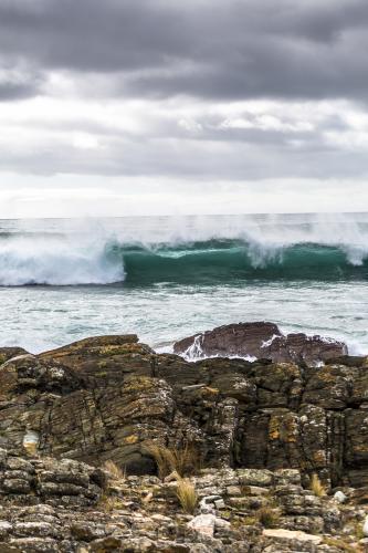 Waves crashing into the rocky coastline