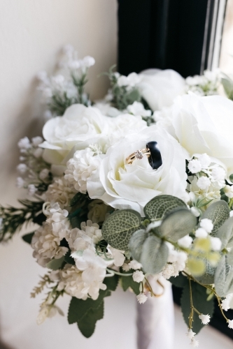 Wedding flowers with wedding rings