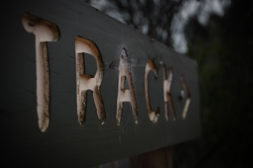 Worn Out Track Marker Sign