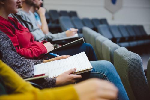 Young adult students in a university lecture hall