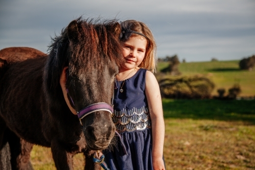 Young girl and her Pony
